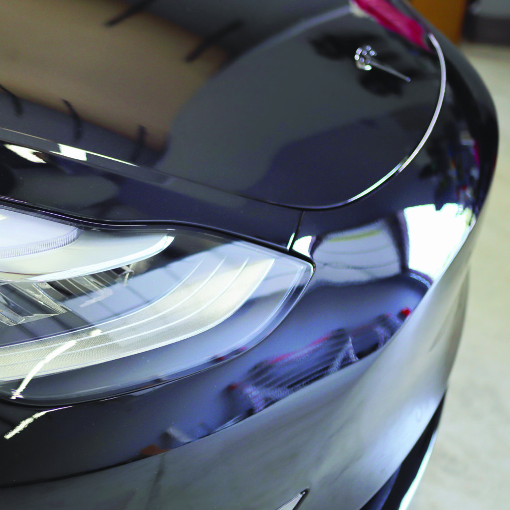 Black tesla with ceramic coating applied