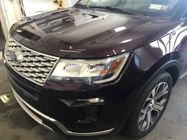 Purple ford explorer with paint protection film applied