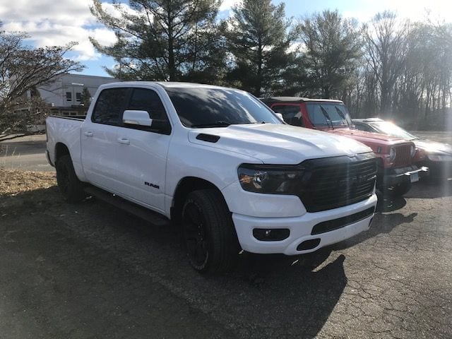 White dodge ram with ceramic coating and window film applied