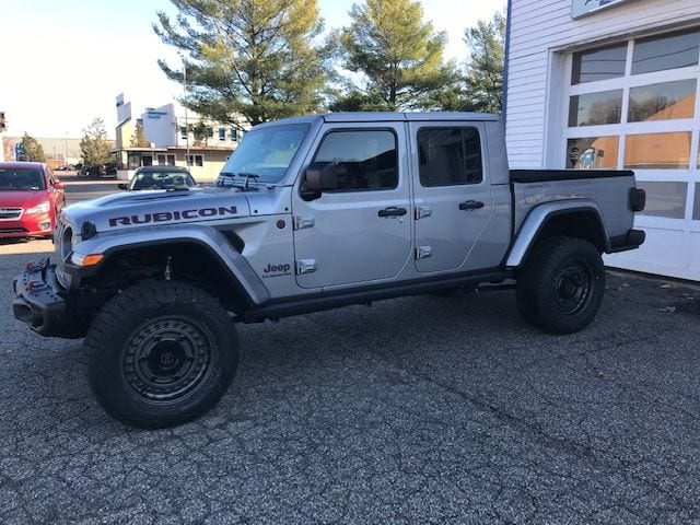 Grey jeep gladiator with window film applied